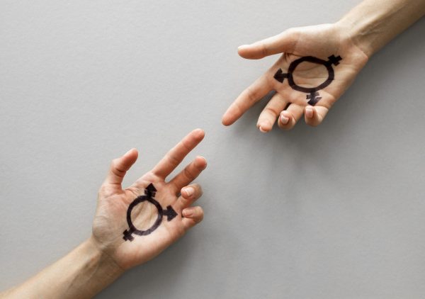 hands-with-transgender-sign